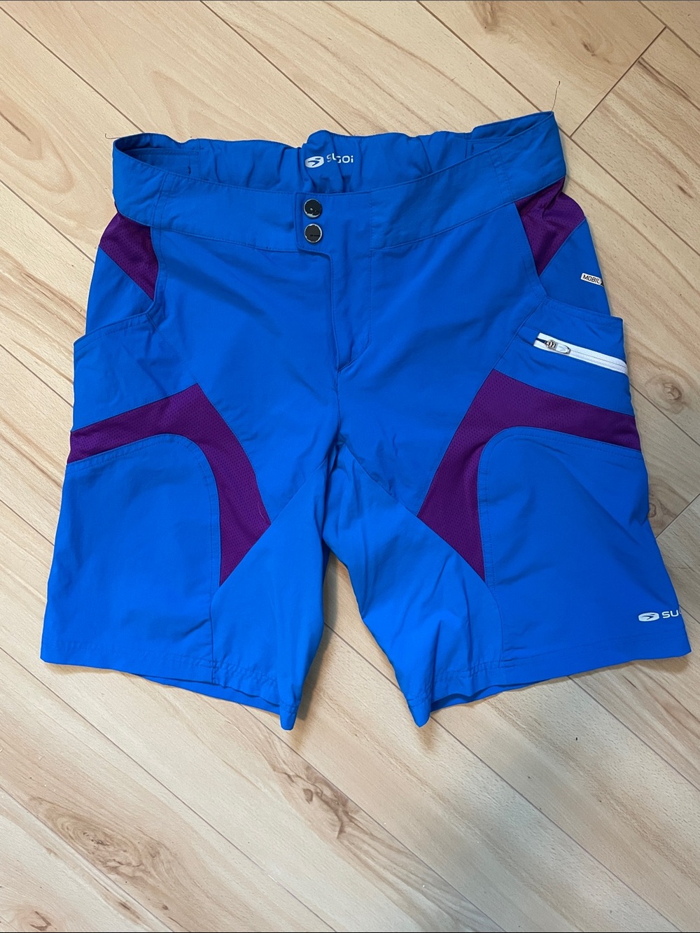 SUGOI Women's Sz M EVO-X Cycling Short in Bright Blue with Purple Accents